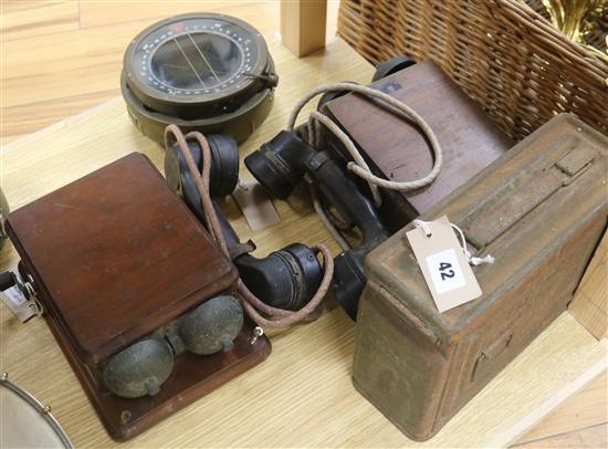 A Lancaster Bomber Type P4A flying compass No. 36764T, a pair of WWII telephone sets and an ammunition box